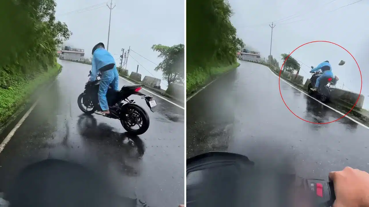 बारिश में पहाड़ी मोड़ पर मौत को दी मात! खाई के किनारे लटका बाइकर, वायरल वीडियो देख दहल गए लोग